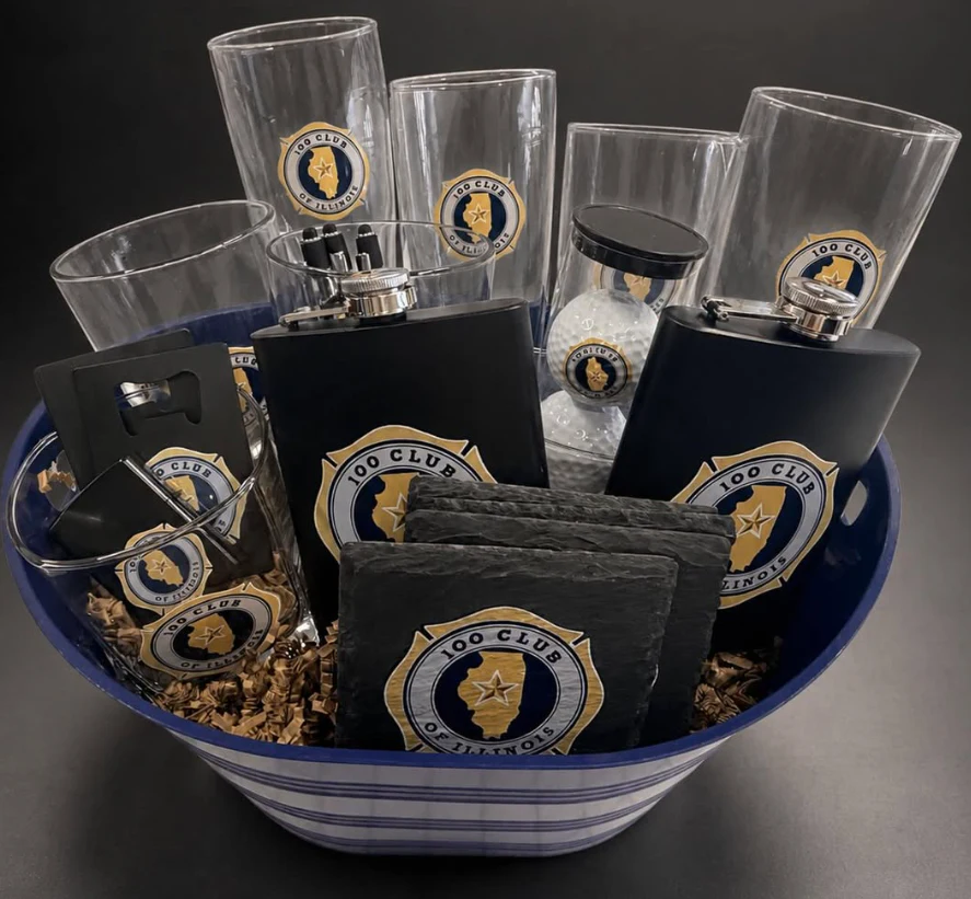 Recognition plaque, tumbler, award and promotional products in a studio display